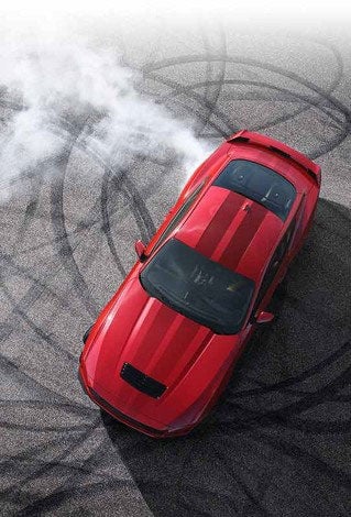 Overhead view of a 2024 Ford Mustang® model with tire tracks on pavement | Bob Poynter Ford, Inc. in Seymour IN